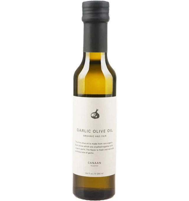 A photo of a bottle of Garlic Olive Oil. Organic and Fair Trade, this olive oil comes from Palestine.
