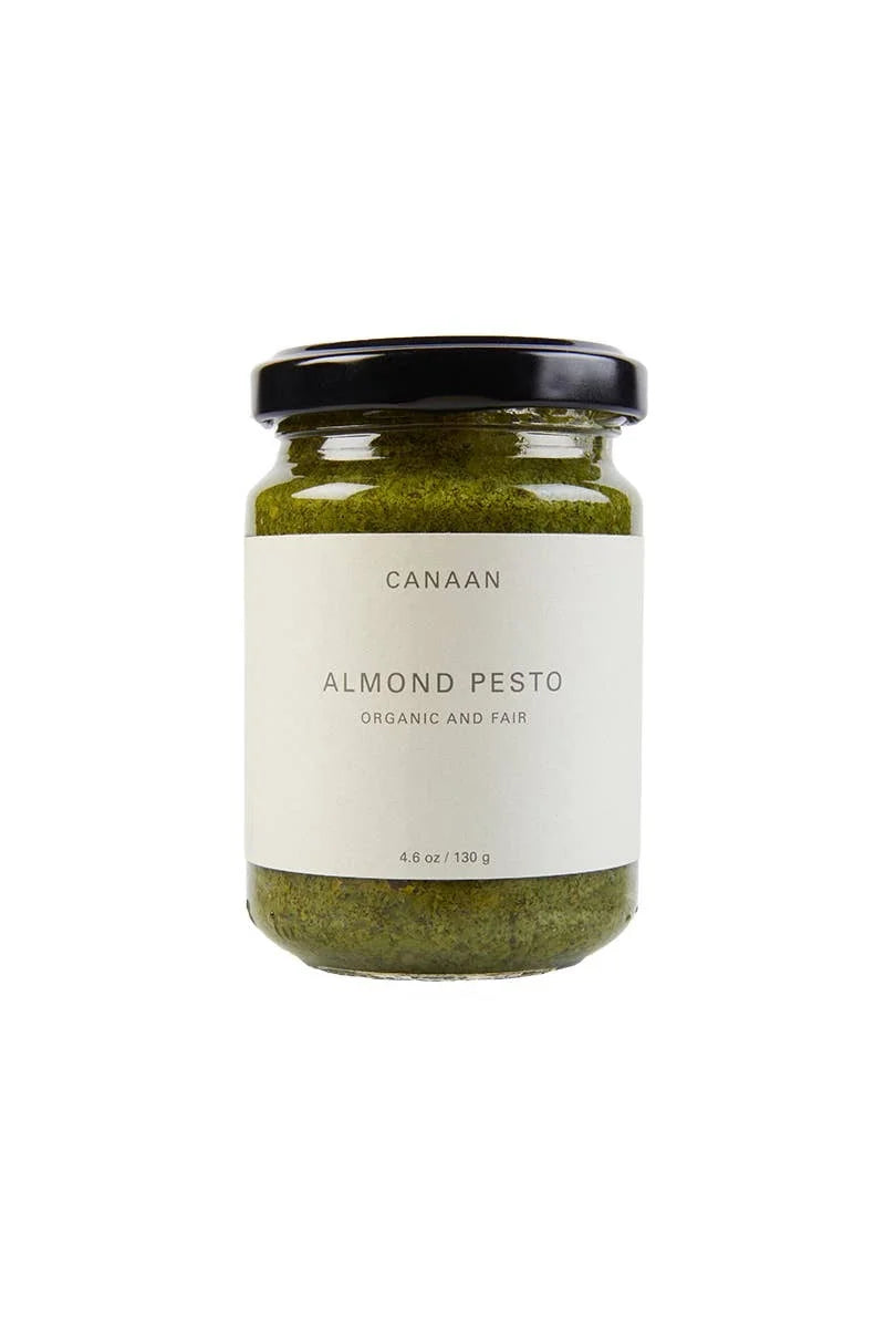 A photo of a jar of Almond Pesto that is organic and fair trade from Palestine.