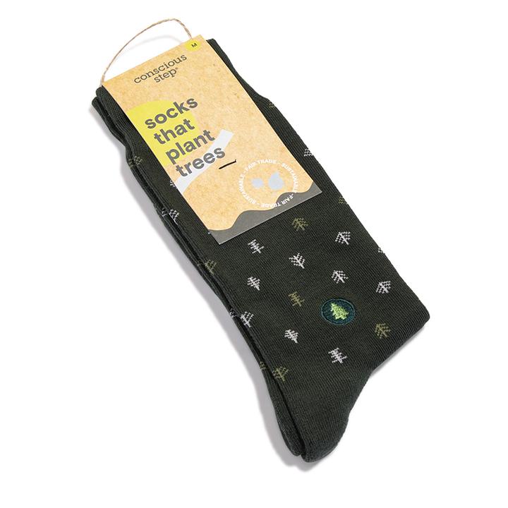 A photo of a pair of dark green socks featuring tiny trees in grey and green and a tree embroidery that help plant trees through non-profit donations with each purchase of these fair trade socks made in India.
