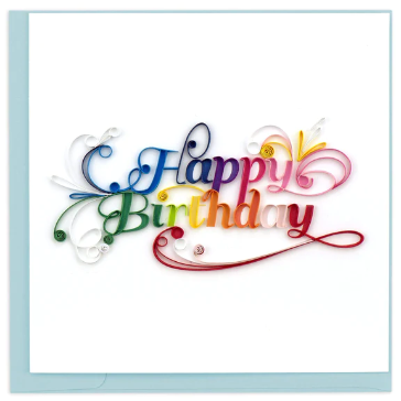 A photo of a quilled 'Happy Birthday' in a swirl writing on a card made in Vietnam