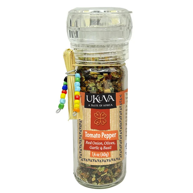 A photo of a spice grinder from Ukava 'A taste of Africa' This spice grinder is the Tomato Pepper. Listed as Red Onion, Olives, Garlic, and Basil flavors. 