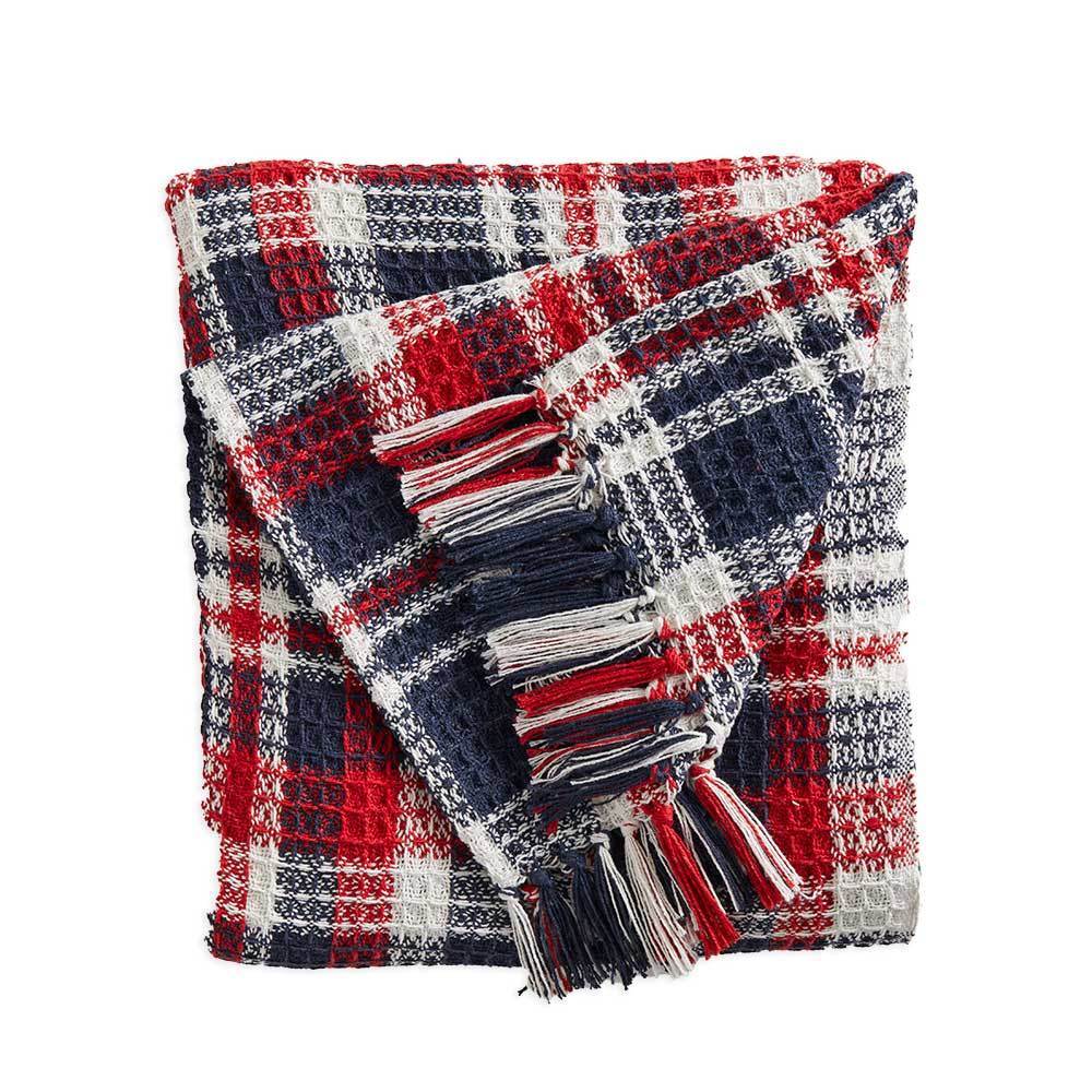 A photo of a plaid throw in Red, White, and Blue that is beautifully handcrafted in India.