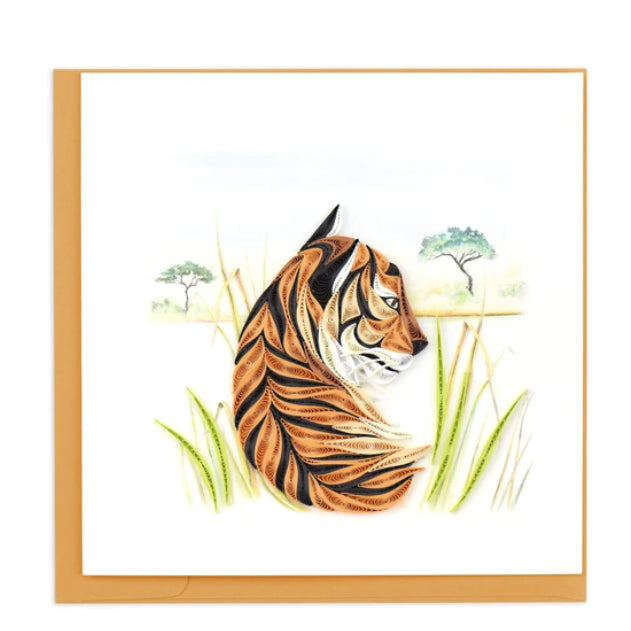 A photo of an intricately quilled greeting card made in Vietnam.  This card featured a Bengal tiger on the front with a watercolor nature scene background. 
