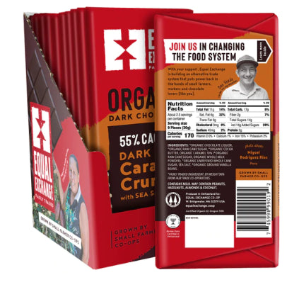 A photo of a chocolate bar that is all organic and fair trade from Equal Exchange. 'Grown by Small farmer co-ops'. This chocolate bar is the Dark Chocolate Caramel Crunch with Sea Salt Bar. 