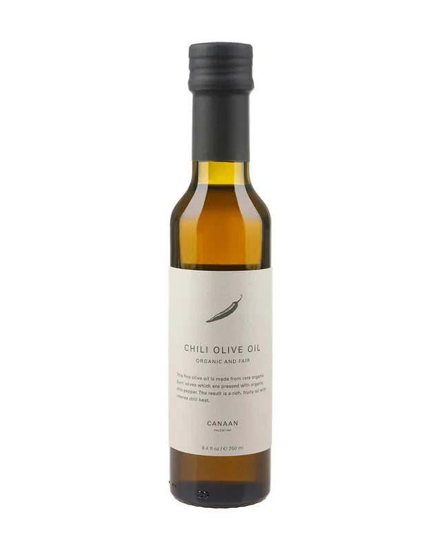 A photo of a bottle of Chili Olive Oil. Organic and Fair Trade, this olive oil comes from Palestine. 
