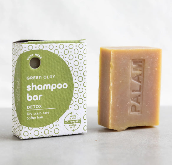 A photo of a Shampoo Bar made with Green Clay to promote Detox, helping dry scalp care making softer hair from India.