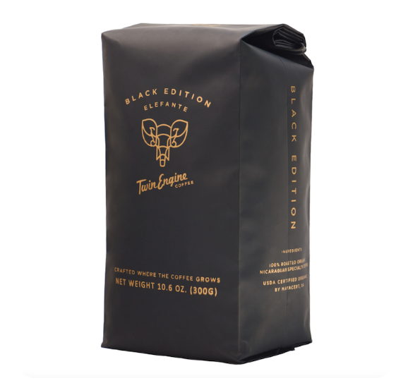 A photo of a bag of coffee. This is Twin Engine coffee made ethically in Nicaragua, grown, harvested, roasted, and packaged at the source - supporting the Nicaragua farmers. This roast is the Black Edition of 'Elefante'.