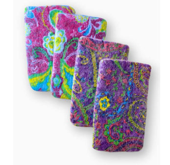A photo of felt eyeglass holders that are infused with a cotton design. They vary in color and pattern. 