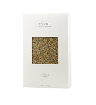 A photo of a box of Freekeh 'Ecological and Fair' grain from Canaan Palestine. 