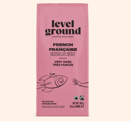 A photo of a bag of coffee with a spaceship on the teal bag. This is Level Ground Coffee's 'French' very dark Roast. 