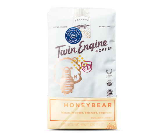 A photo of a bag of coffee. This is Twin Engine coffee made ethically in Nicaragua, grown, harvested, roasted, and packaged at the source - supporting the Nicaragua farmers. This roast is 'Honeybear' Medium Roast.