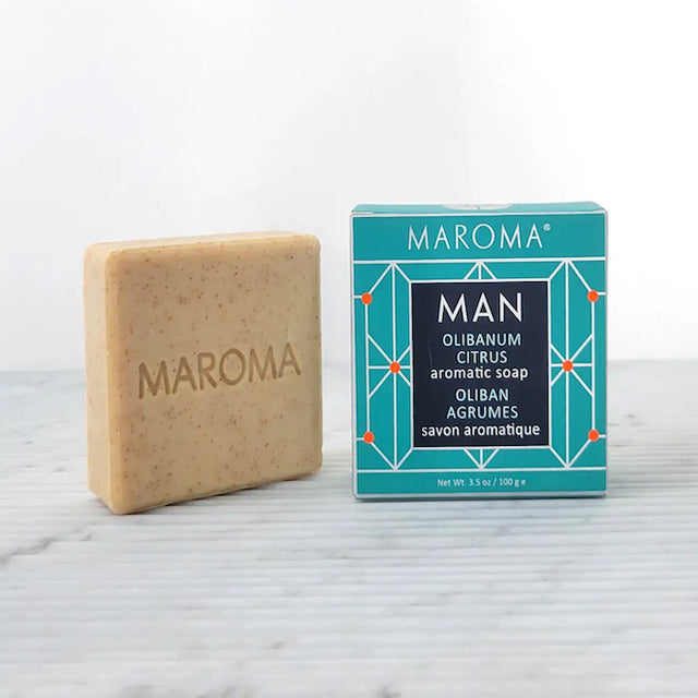 A photo of a Maroma Man soap from India. This bar's scent is olibanum citrus.
