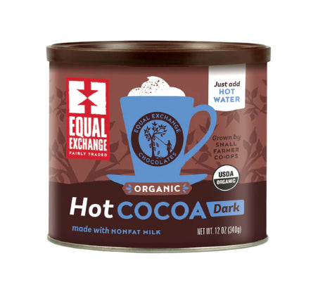 A photo of cocoa that is all organic and fair trade from Equal Exchange. 'Grown by Small farmer co-ops'. This cocoa is the Hot Dark cocoa flavor made with nonfat milk.. 