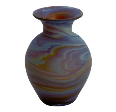 A photo of a vase with swirls of different colors of blue made in West Bank out of recycled glass. 