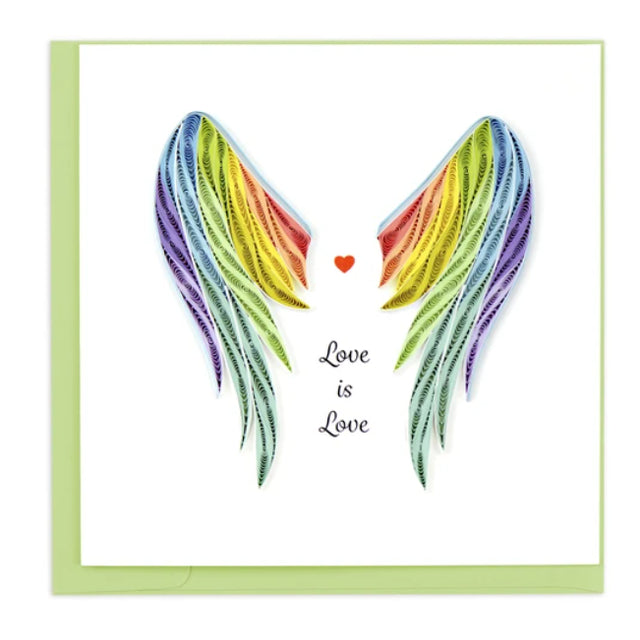 A photo of an intricately quilled greeting card made in Vietnam.  This card featured rainbow colored wings with a little red heart in between with the words "Love is Love"