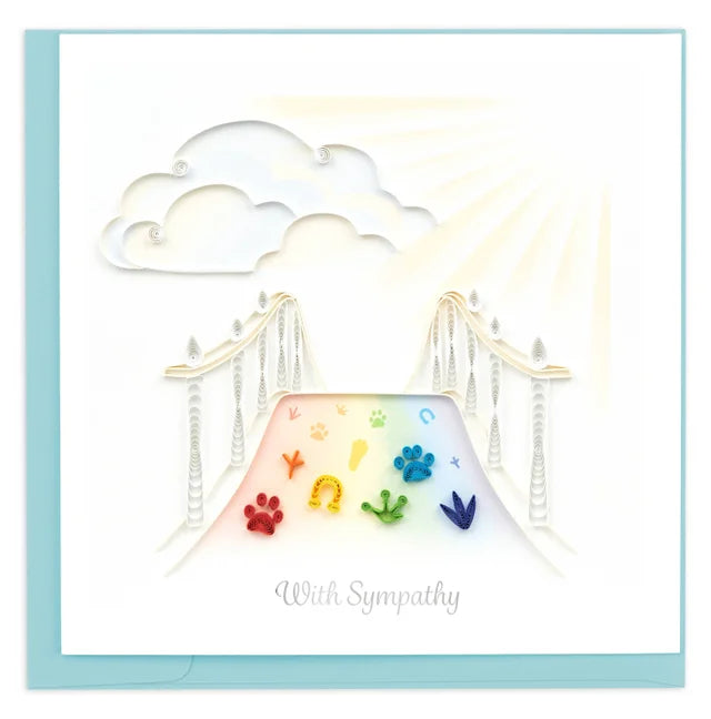 A photo of an intricately quilled art greeting card made from swirling paper in Vietnam. This greeting card says 'With Sympathy' on the bottom with a bridge design above leading to the clouds. On the bridge is different animal footprints, like a bird, dog, cat, horse, etc giving the idea that these beloved animals are on their way to heaven. 