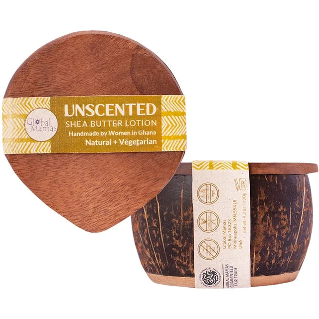 A photo of a coconut shell filled with Unscented Shea Butter Lotion. "Handmade by women in Ghana. Natural and Vegetarian"