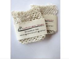 A photo of a silk scrubber soap saver made in Nepal. 