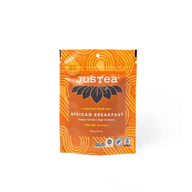 A photo of a stand-up pouch with loose leaf tea from Justea. This is the African Breakfast Black Tea. 