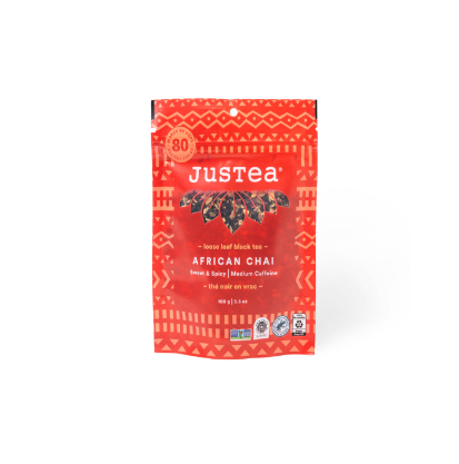 A photo of a stand-up pouch with loose leaf tea from Justea. This is the African Chai Black Tea. 