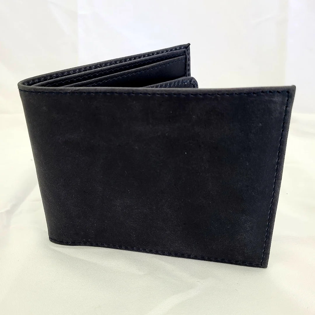A photo of a black wallet made of ethical leather in Nicaragua. 