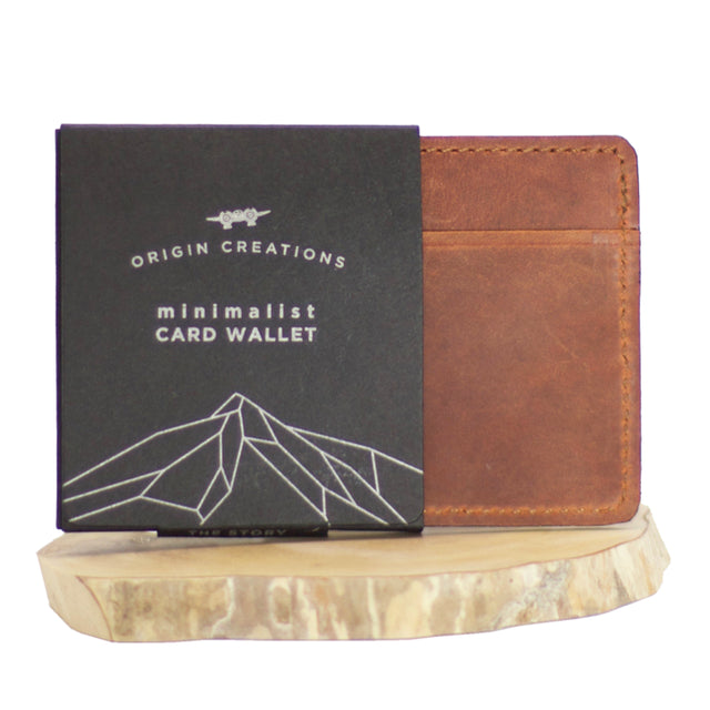 A photo of a brown minimalist wallet made of ethical leather in Nicaragua. 