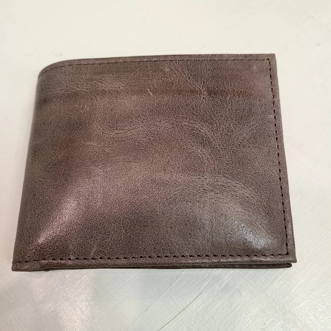 A photo of a brown wallet made of ethical leather in Nicaragua. 