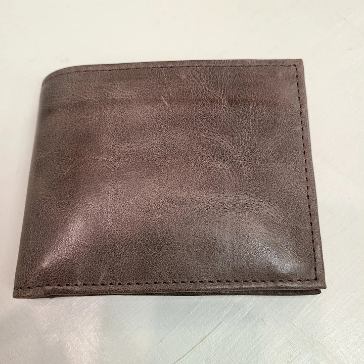 A photo of a brown wallet made of ethical leather in Nicaragua. 
