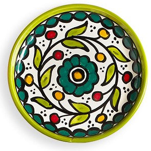 An image of a green Appetizer plate hand crafted in West Bank by fair trade artisans. 